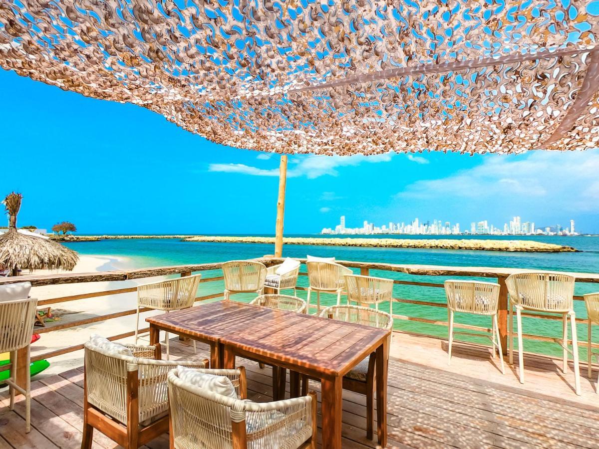 Palmarito Beach Hotel Tierra Bomba Bagian luar foto